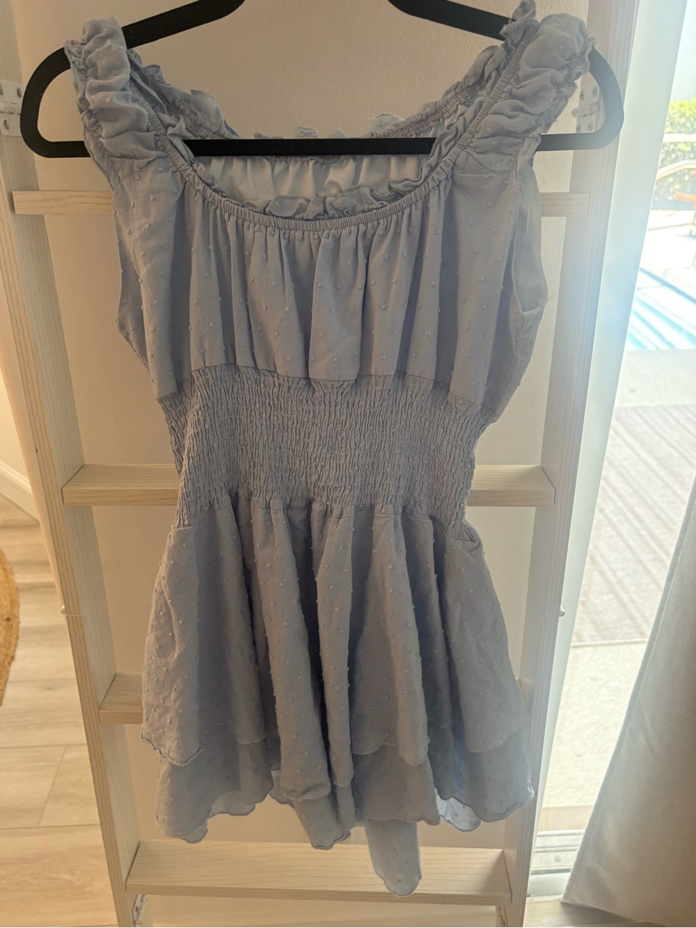Smocked Ruffle Sleeveless romper in Light Blue